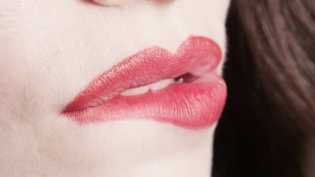 Macro Lips Kissing Bitting Licking With Tongue and Red Lipstick