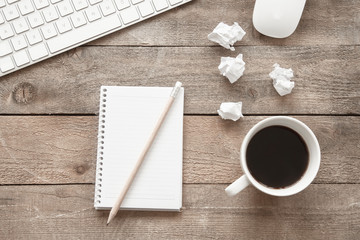 Working table on wooden background