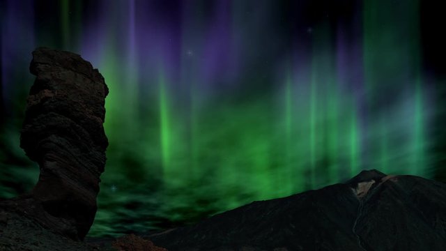 The Aurora Borealis behind Roque Cinchado and Mount Teide in Tenerife.