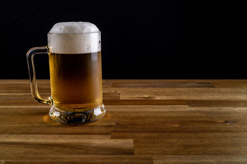 Cold beer on black background
