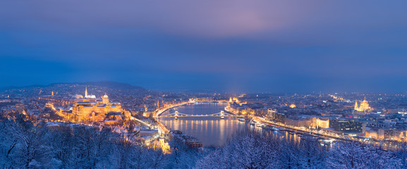 Danube river and Royal Palace in Budapest, winter night panorama