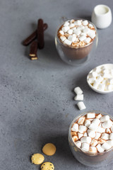 Glass cup of hot chocolate or cocoa drink with marshmallows. Traditional winter or autumn hot drink. Holiday concept, Selective focus.