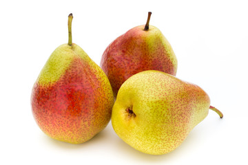 Fresh bio pear with leaves on isolated white background.