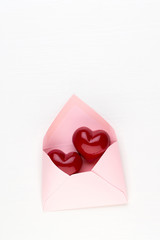 Valentine's Day background.  Letter on white background. Valentines day concept. Flat lay, top view, copy space.