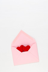 Valentine's Day background.  Letter on white background. Valentines day concept. Flat lay, top view, copy space.