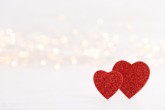 Red heart bokeh background, valentine day greeting card.