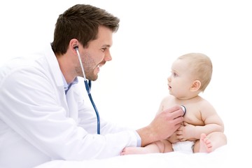 Doctor examining baby with stethoscope