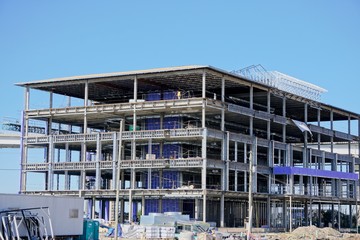 modern building under construction using steel 