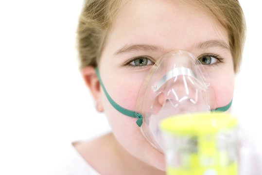 Girl using nebuliser