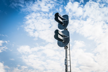 railway semaphore on blue sky background. Railway Traffic light