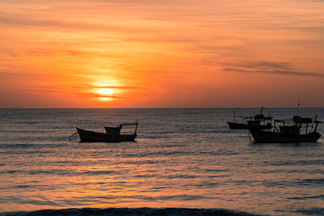 Fishing boat at sunrise in Guaxindiba
