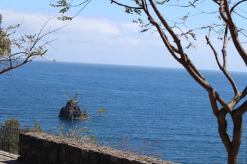 smal rock in the ocean by korfu