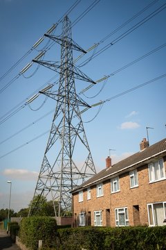 Power lines passing close to houses