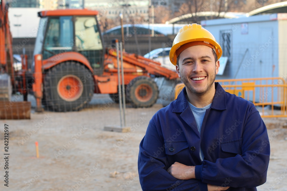 Wall mural Ethnic construction worker with copy space