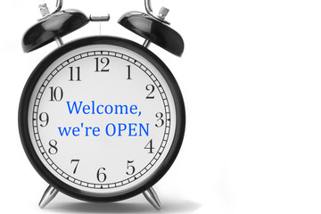 Welcome we're OPEN sign in blue and white, on shop door