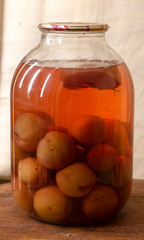 Bank of canned fruit compote on the shelf