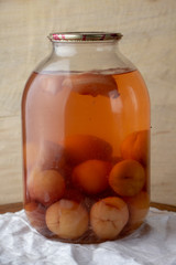 Bank of canned fruit compote on the shelf