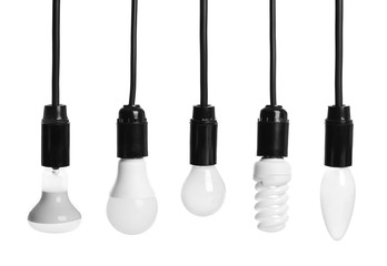 Set with different lamp bulbs on white background