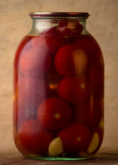 Bank of canned fruit compote on the shelf
