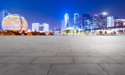 Urban skyscrapers with empty square floor tiles