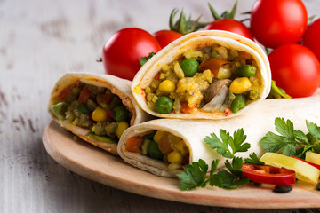 Tasty homemade burritos with vegetables