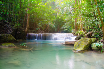 Naklejka premium waterfall in deep forest , thailand