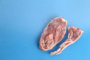 frozen lamb ribs on colorful background