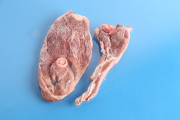 frozen lamb ribs on colorful background