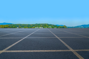 Fototapeta premium Empty asphalt road and natural landscape under the blue sky