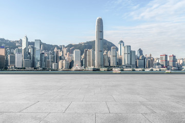 Obraz premium Empty marble floors and city views under the blue sky
