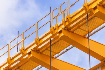 Close-up of footbridges of a launching girder against blue sky