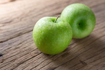 Fresh Green Apple on Wood