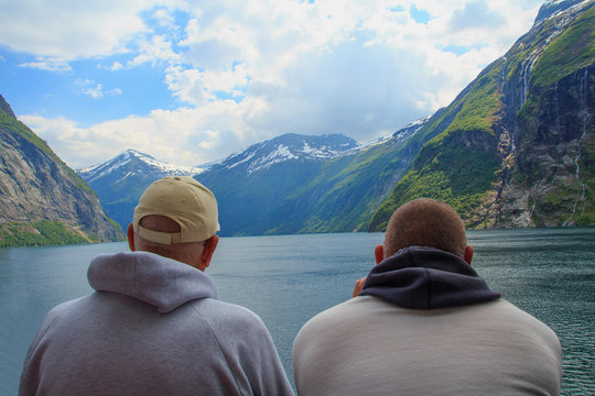 Two men enjoy the fjords. Beautiful Nature Norway