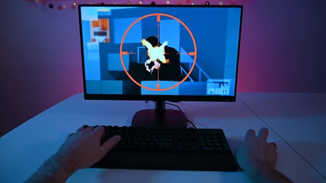 Personal perspective from player who plays a video game on a computer screen