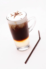 Black coffee, cappuccino, baked milk In a clear glass on a white background