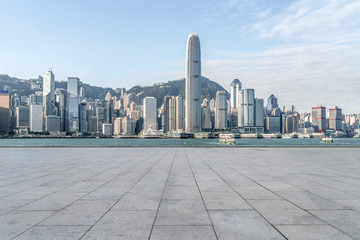 Obraz premium Empty marble floors and city views under the blue sky