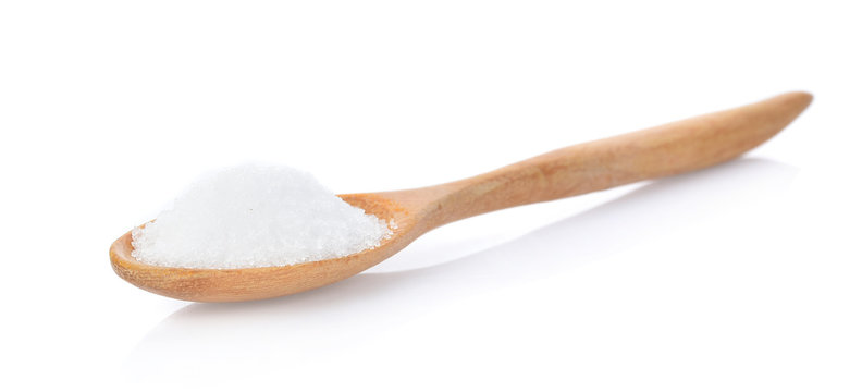 Salt In Wooden Spoon On White Background