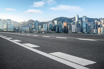 Obraz premium Air highway asphalt road and office building of commercial building in modern city