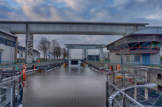 Passenger boat passing through canal locks near Amsterdam, Holland