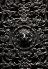 Decorative window metal door with a lion