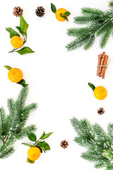 pile of tangerines, fir tree and cinnamon for New Year and Christmas celebration on white background top view mock up