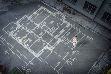 Woman engineer thinking over his plan. Mixed media