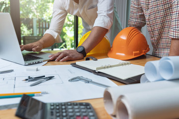 Engineer and Architect concept, Engineer Architects office team working with blueprints