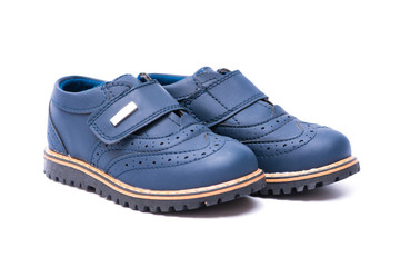 Blue baby shoes isolated on white background