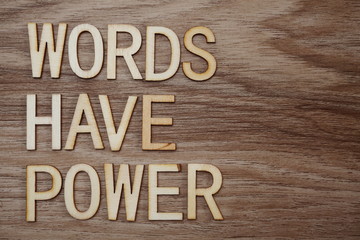 Words Have Power alphabet letters on wooden background business concept