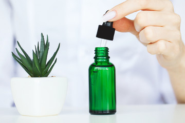 Scin Care. Scientist hands testing texture of beauty products