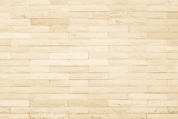 Seamless Cream pattern of decorative brick sandstone wall surface with concrete of modern style design decorative uneven have cracked realmasonry wall of multicolored stones or blocks white cement.