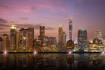Obraz premium Bangkok urban cityscape skyline night scene with empty marble tile floor on front
