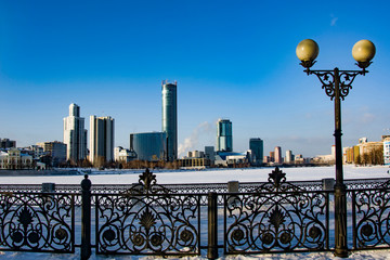 Russia. Yekaterinburg. Embankment of the city pond with views of Ekaterinburg-city . Famous iconic places in the city .