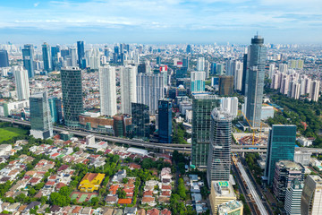Fototapeta na wymiar High buildings under blue sky in Jakarta